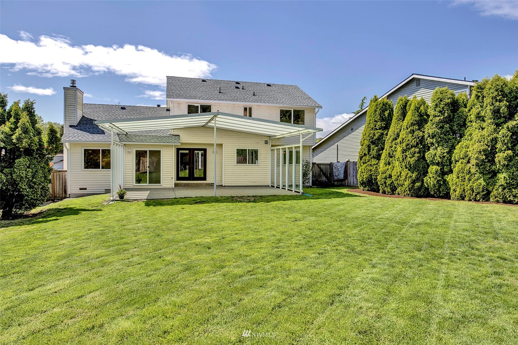 23413 12th Place West Bothell, WA 98021 - Photo 26 of 39 a front view of a house with a garden