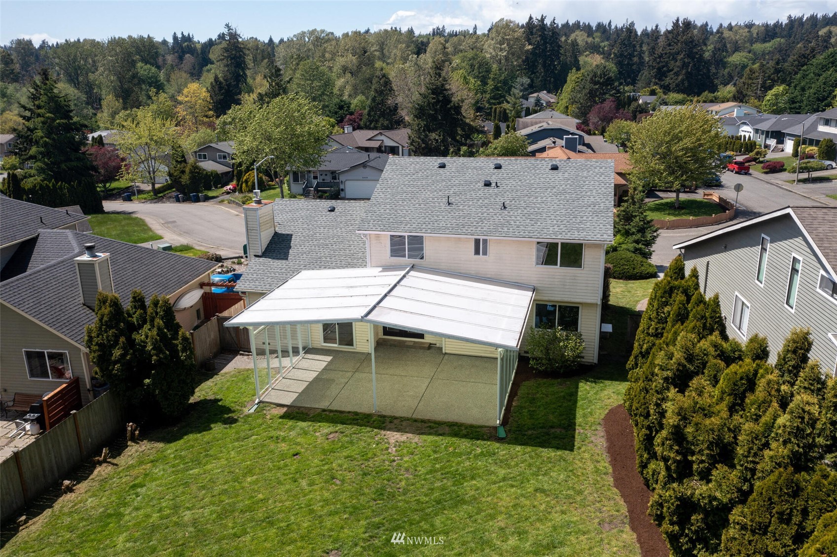 23413 12th Place West Bothell, WA 98021 - Photo 29 of 39 a view of a house with pool and garden