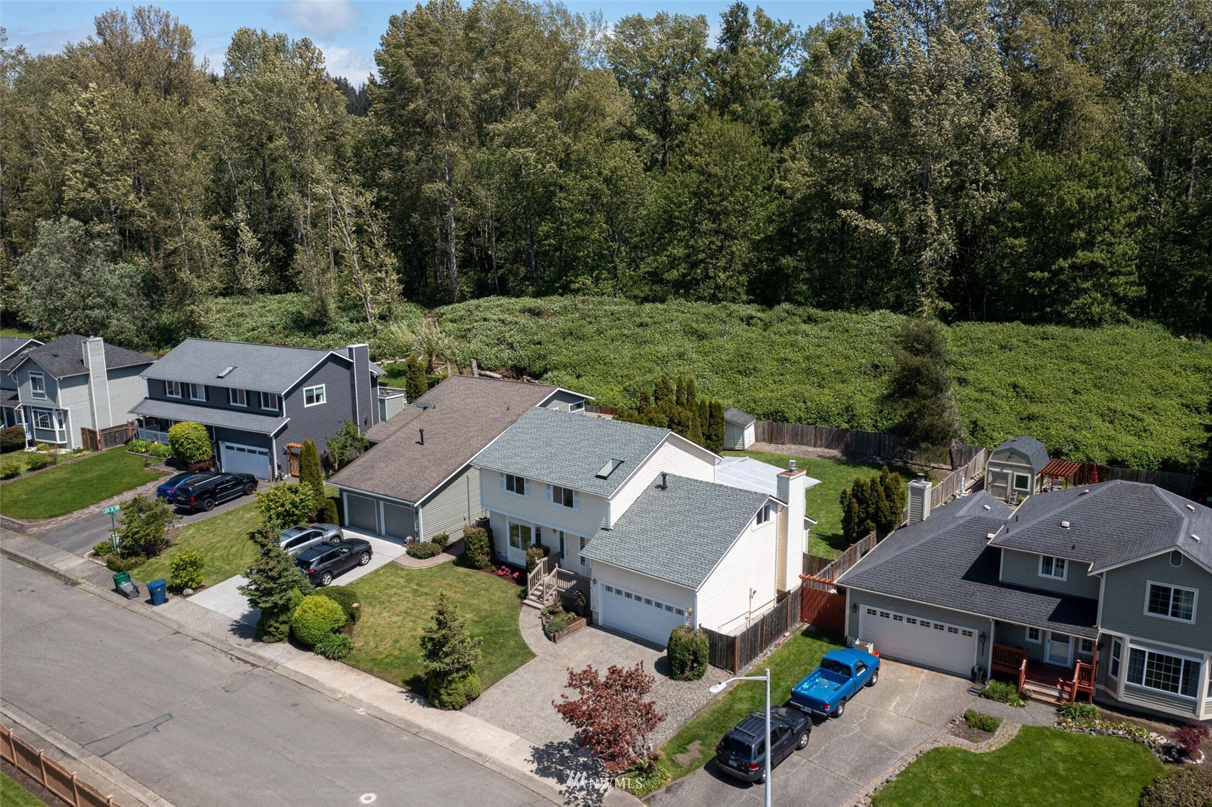 23413 12th Place West Bothell, WA 98021 - Photo 35 of 39 an aerial view of a house with garden space and street view