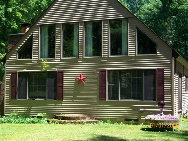 6 Pine Valley Road Northampton, MA 01062 - Photo 3 of 30 a view of a house with a yard and plants