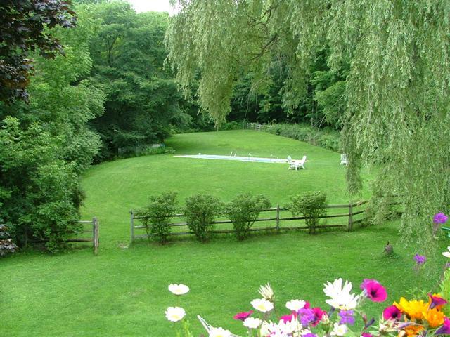 21 Interlaken Road Stockbridge, MA 01266 - Photo 15 of 16 a view of a golf course with a lake
