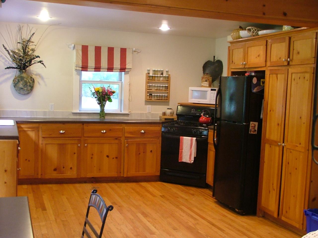 21 Interlaken Road Stockbridge, MA 01266 - Photo 7 of 16 a kitchen with stainless steel appliances granite countertop a refrigerator and a sink
