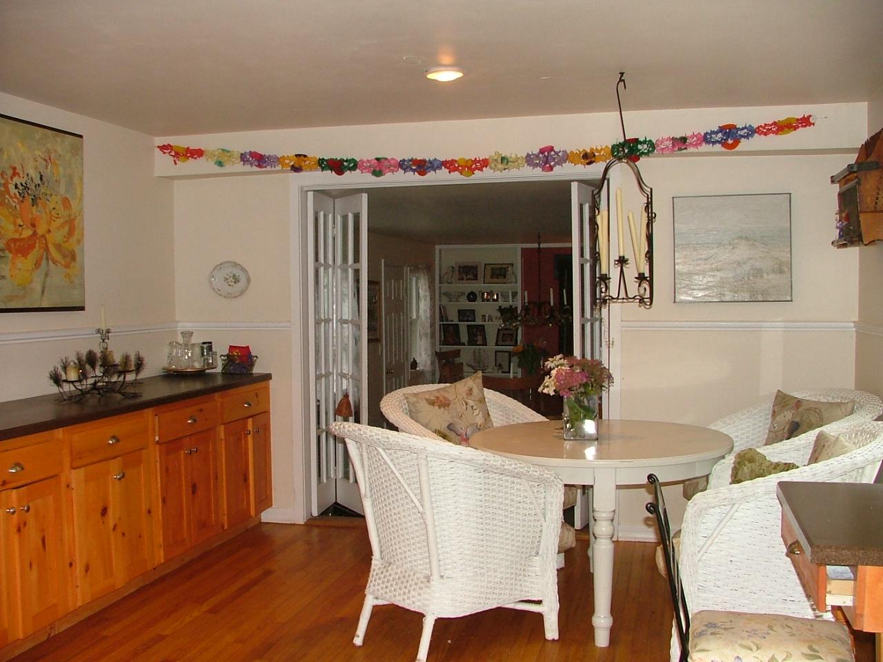 21 Interlaken Road Stockbridge, MA 01266 - Photo 8 of 16 a kitchen with a table and chairs in it