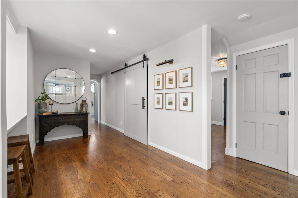4 Stevens Road Wellesley, MA 02482 - Photo 15 of 39 a view of a livingroom with furniture and wooden floor