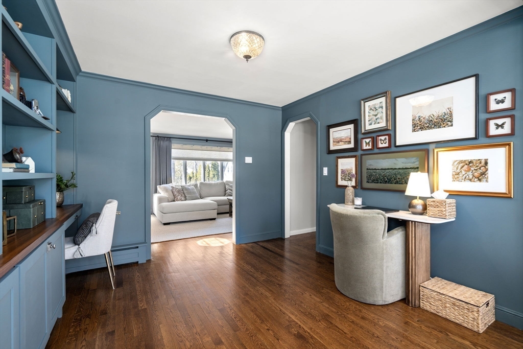 4 Stevens Road Wellesley, MA 02482 - Photo 20 of 39 a living room with furniture and a fireplace
