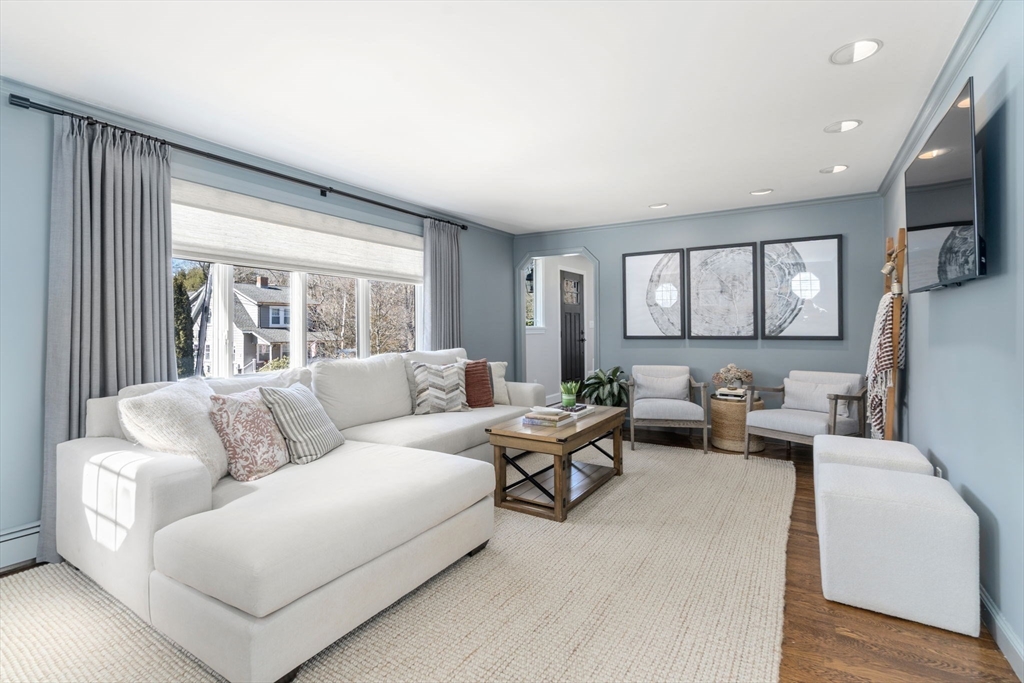 4 Stevens Road Wellesley, MA 02482 - Photo 22 of 39 a living room with furniture and a large window