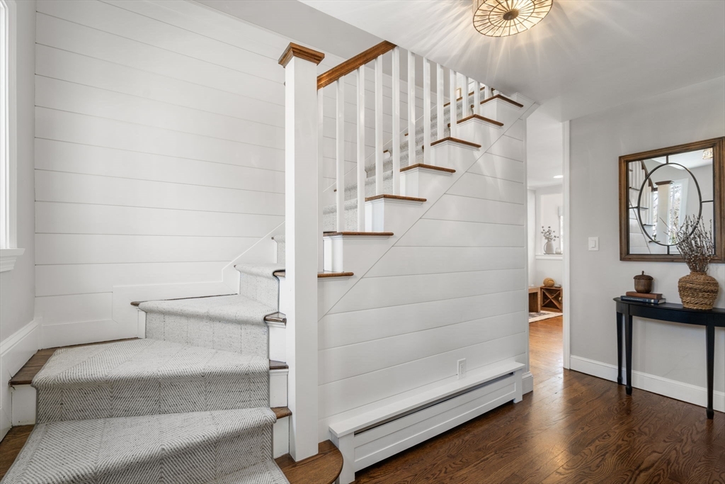 4 Stevens Road Wellesley, MA 02482 - Photo 23 of 39 a view of entryway and hall with wooden floor