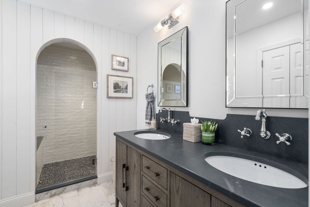 4 Stevens Road Wellesley, MA 02482 - Photo 26 of 39 a bathroom with a granite countertop double vanity sink and mirror