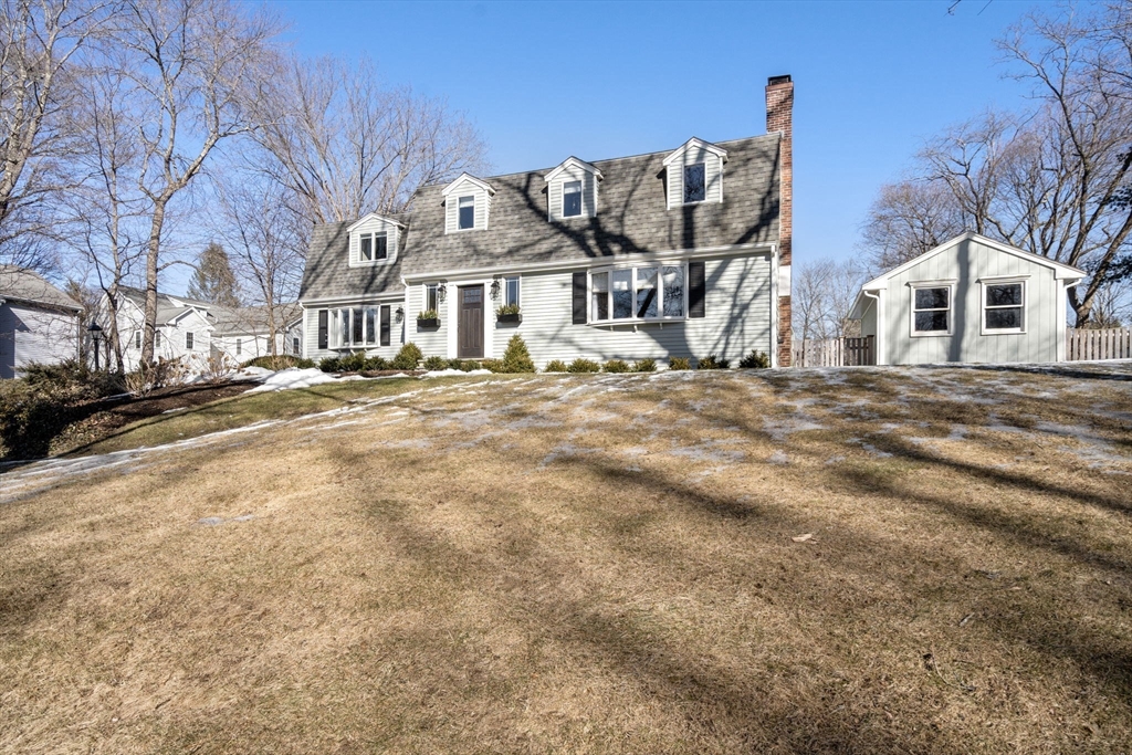 4 Stevens Road Wellesley, MA 02482 - Photo 34 of 39 a view of a big house with a big yard and large trees