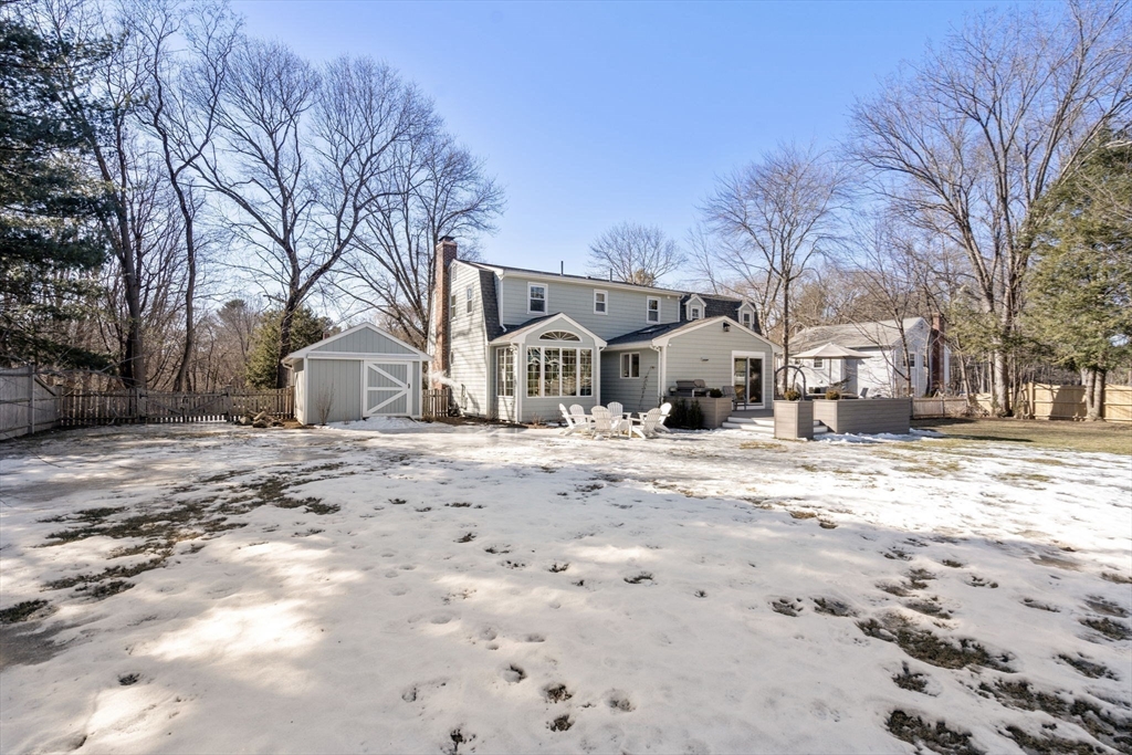4 Stevens Road Wellesley, MA 02482 - Photo 39 of 39 a view of a white house with a snow on the road