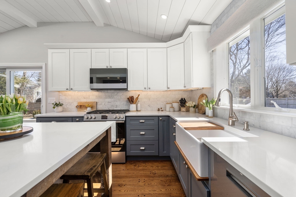 4 Stevens Road Wellesley, MA 02482 - Photo 6 of 39 a kitchen with a stove a sink and a refrigerator