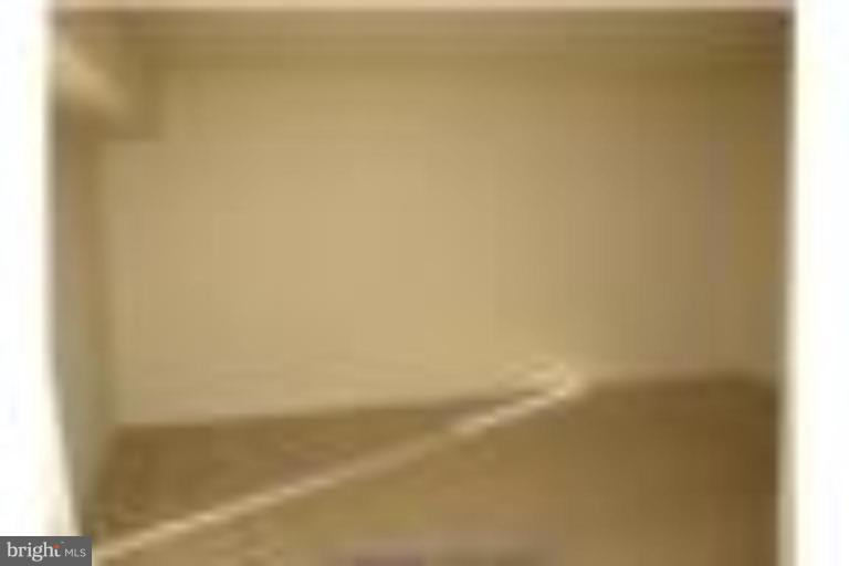 11619 Stoneview Square, Unit 74/1B Reston, VA 20191 - Photo 3 of 5 a view of an empty room