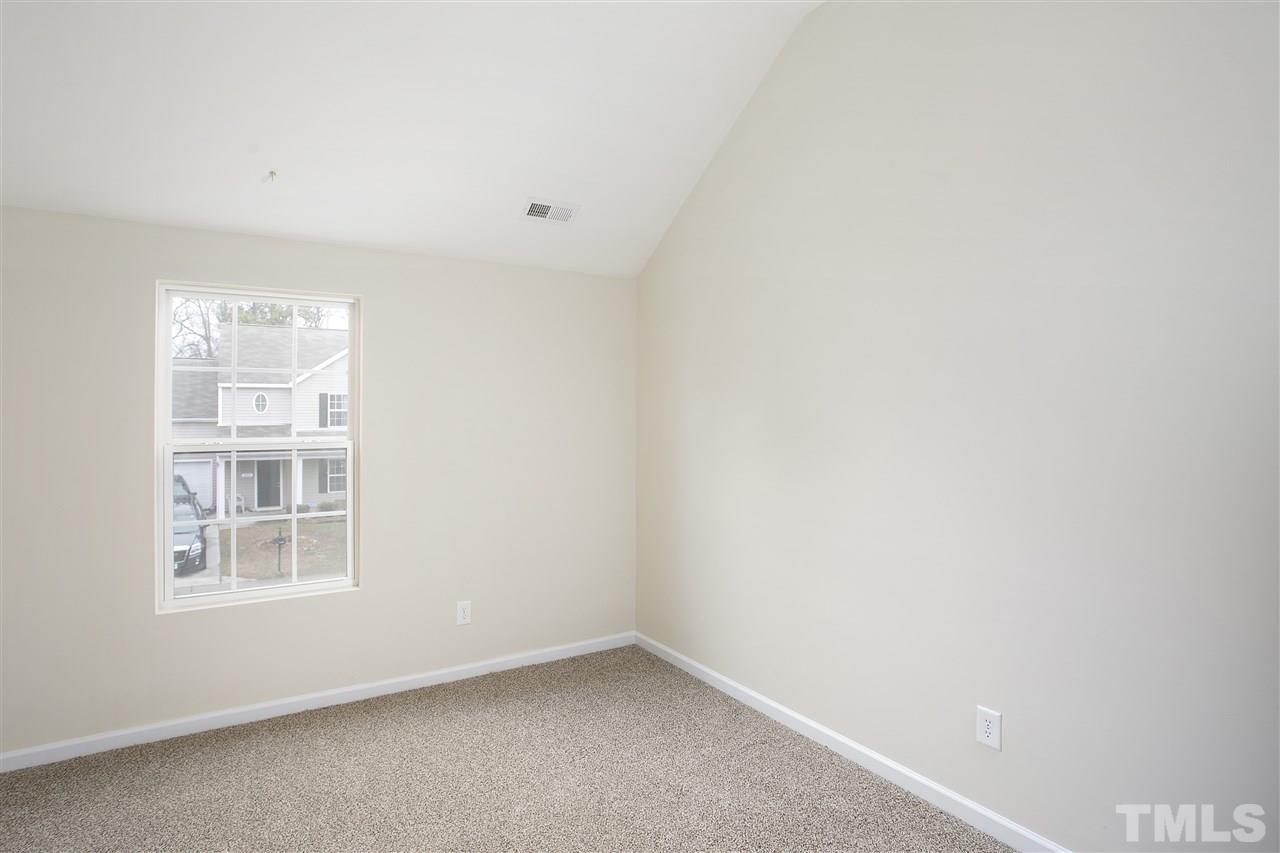 1112 Lombar Street Raleigh, NC 27610 - Photo 16 of 19 an empty room with windows
