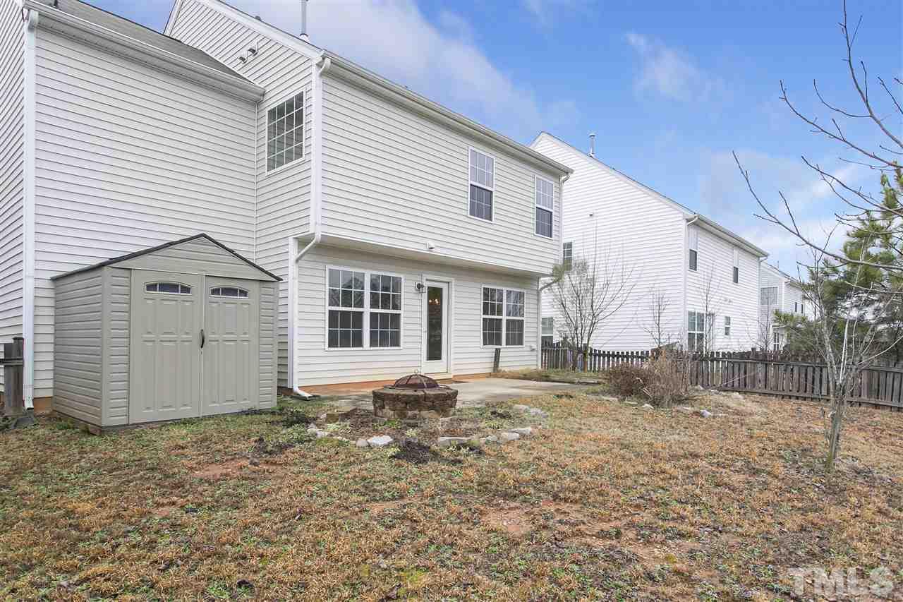 1112 Lombar Street Raleigh, NC 27610 - Photo 17 of 19 a view of a house with a yard