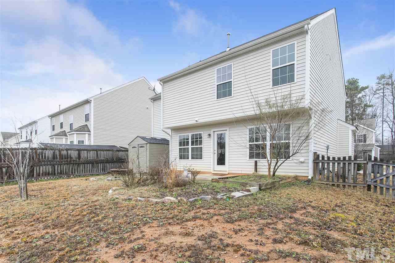 1112 Lombar Street Raleigh, NC 27610 - Photo 19 of 19 a view of a house with a yard