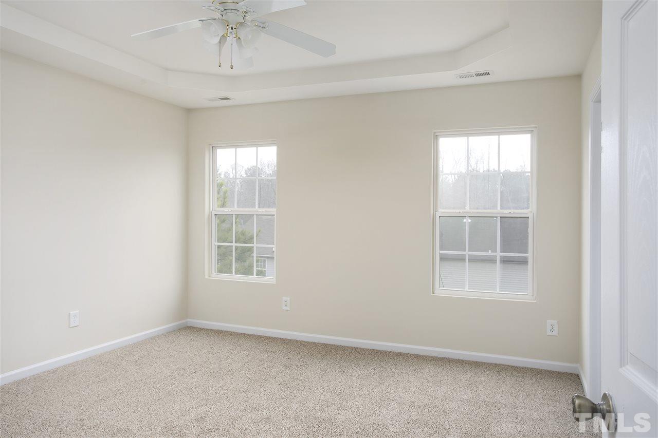 1112 Lombar Street Raleigh, NC 27610 - Photo 10 of 19 an empty room with a window