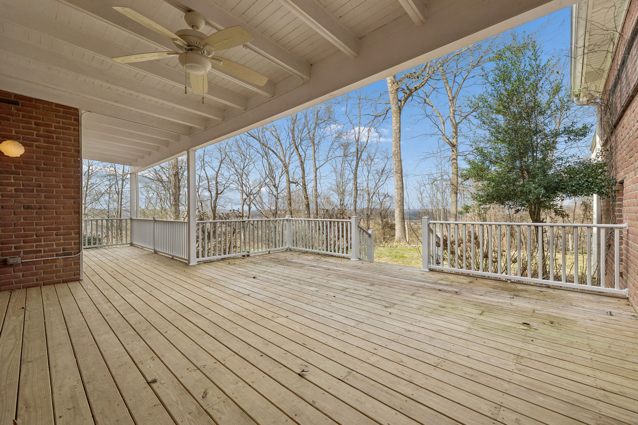 1010 Street Road Kingston Springs, TN 37082 - Photo 93 of 98 a view of an empty room with wooden floor and fence