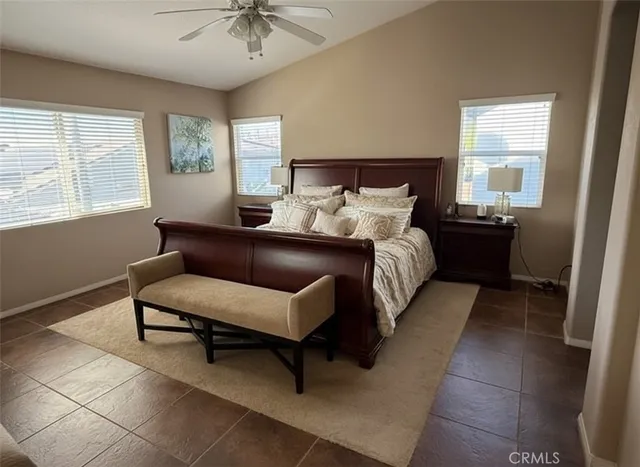 a bed room with a bed and a couch