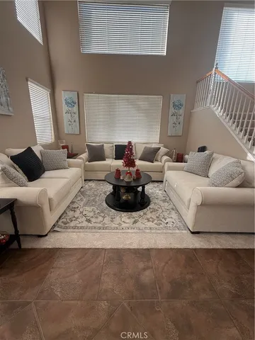 a living room with furniture and a couch
