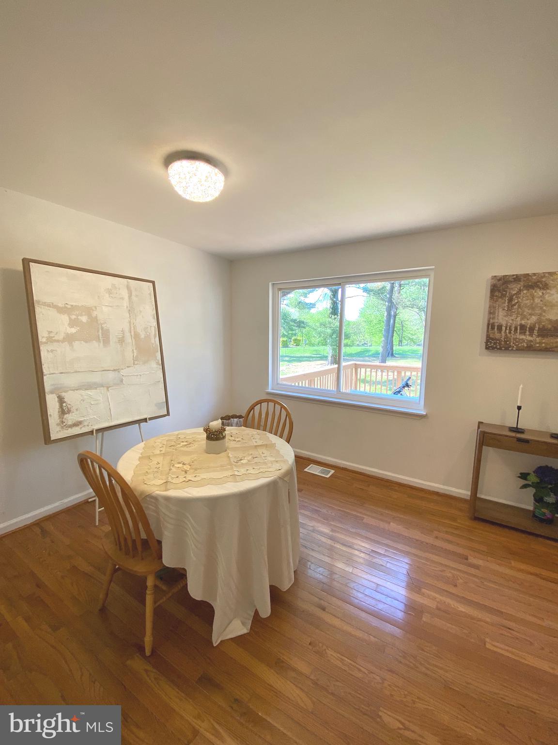 322 West Deer Park Road, Unit 2C Gaithersburg, MD 20877 - Photo 13 of 32 a dining room with table and chairs