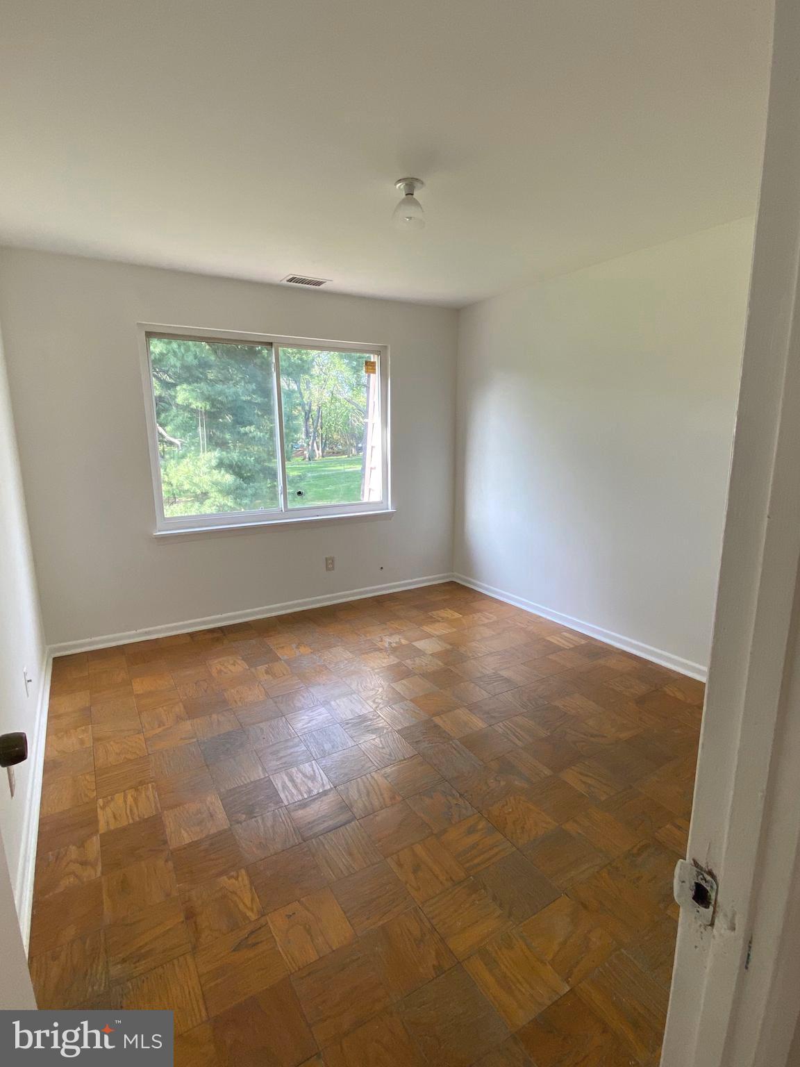 322 West Deer Park Road, Unit 2C Gaithersburg, MD 20877 - Photo 16 of 32 an empty room with windows