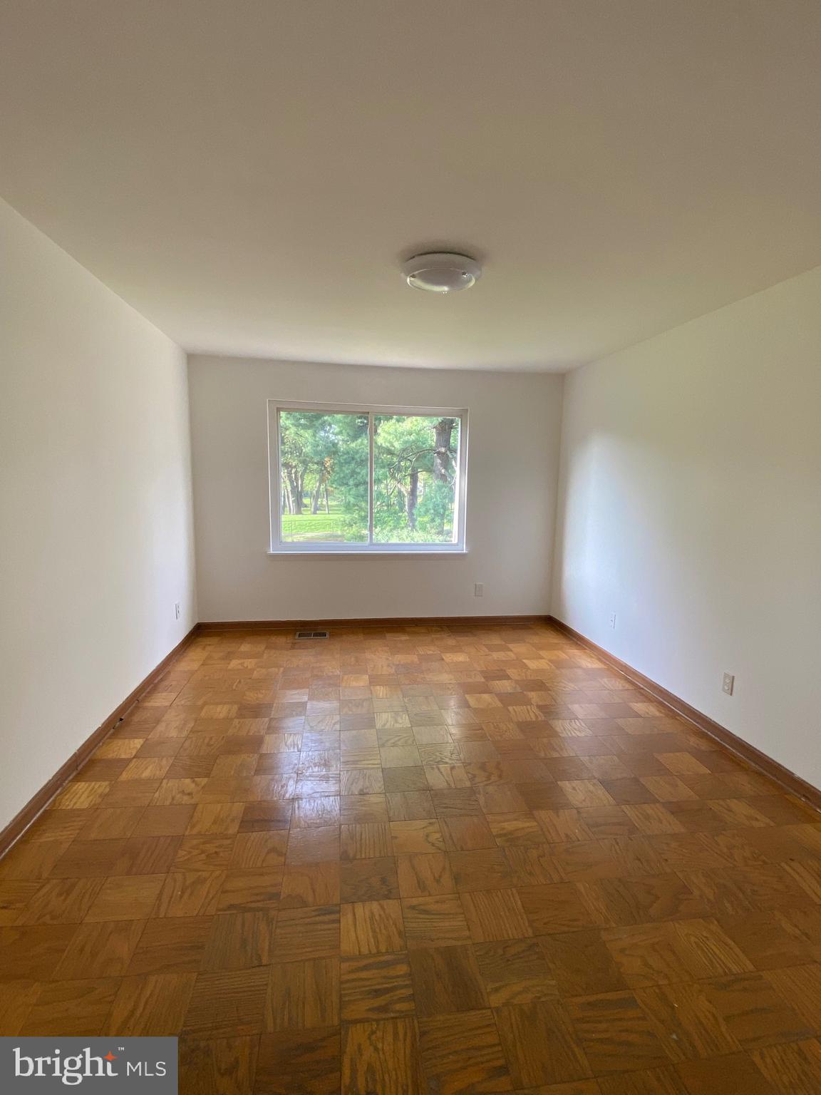 322 West Deer Park Road, Unit 2C Gaithersburg, MD 20877 - Photo 17 of 32 an empty room with a window