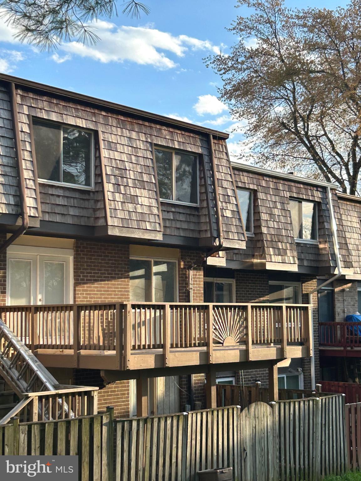 322 West Deer Park Road, Unit 2C Gaithersburg, MD 20877 - Photo 2 of 32 a front view of a house with a balcony
