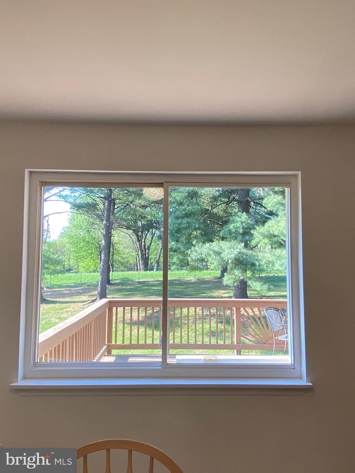 322 West Deer Park Road, Unit 2C Gaithersburg, MD 20877 - Photo 24 of 32 a view of a room that has a large window and front of red