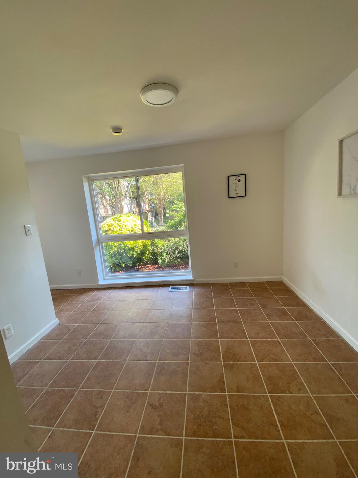 322 West Deer Park Road, Unit 2C Gaithersburg, MD 20877 - Photo 29 of 32 a view of an empty room with a window