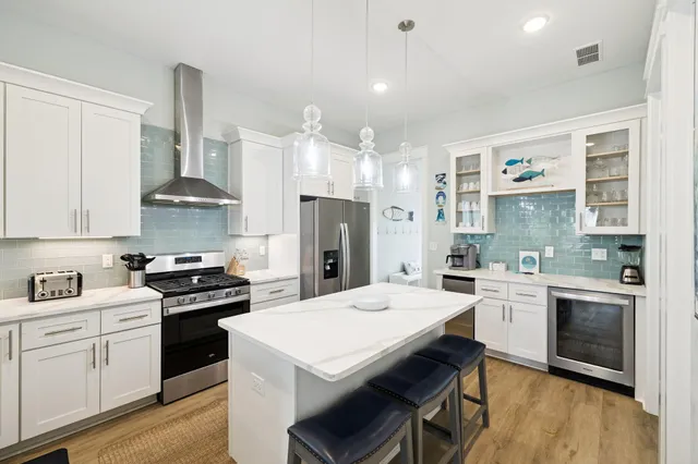 a bedroom with a bed tv and a mirror