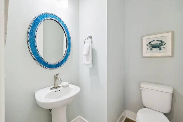 a bathroom with a double vanity sink and a window
