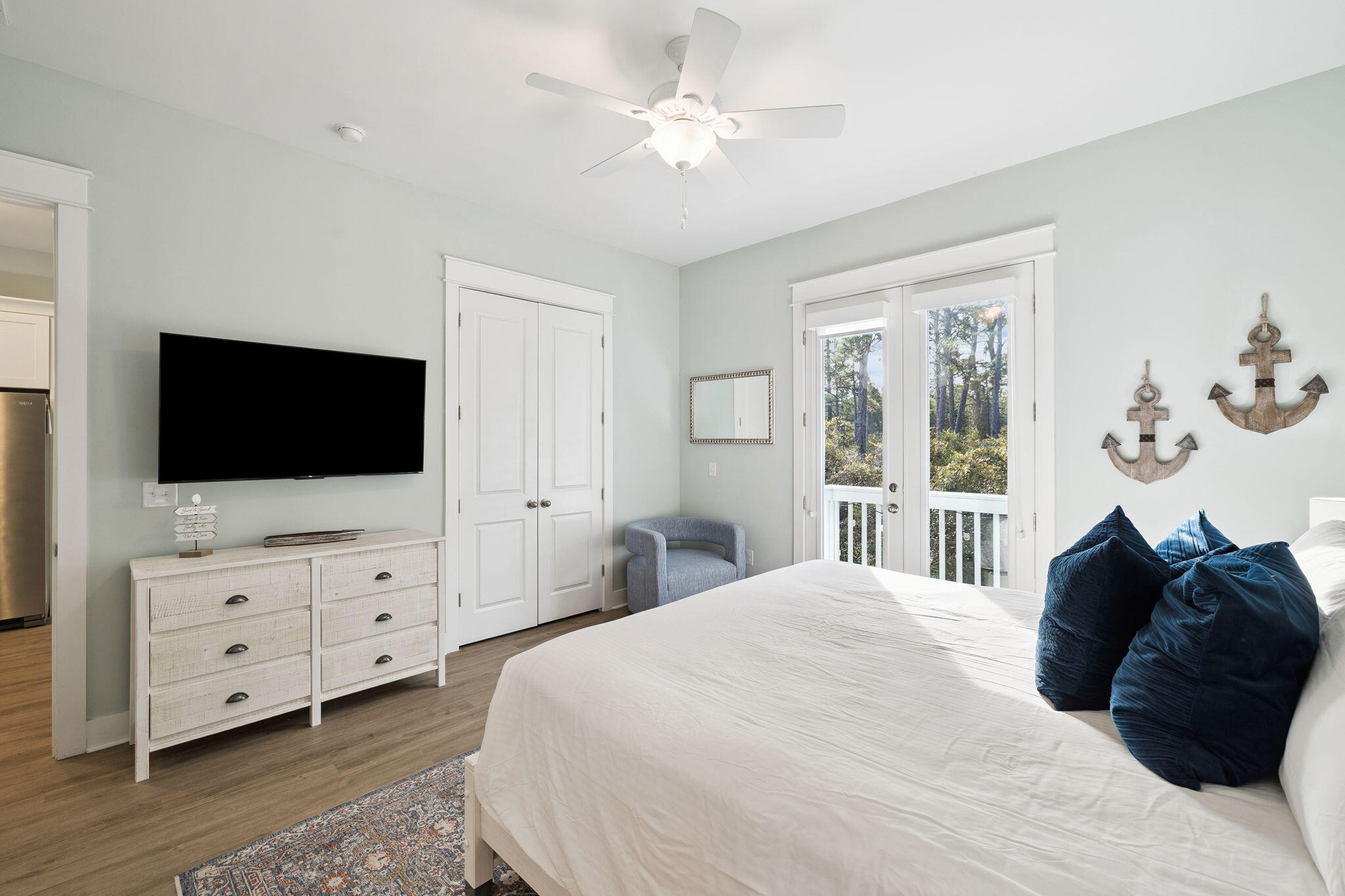 345 Dolphin Drive Santa Rosa Beach, FL 32459 - Photo 27 of 73 a bedroom with a bed tv and a mirror
