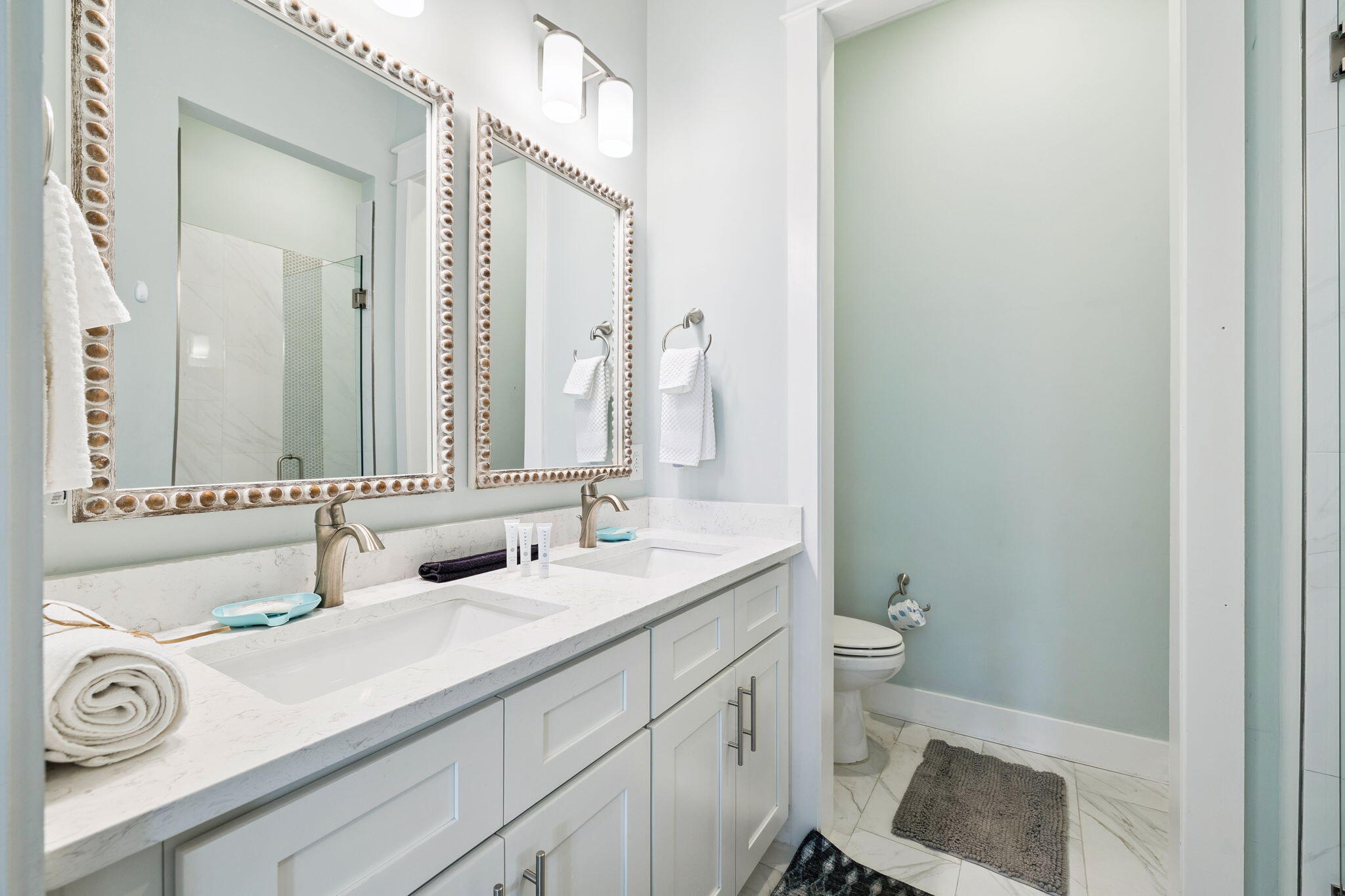 345 Dolphin Drive Santa Rosa Beach, FL 32459 - Photo 29 of 73 a bathroom with a sink and a mirror with toilet