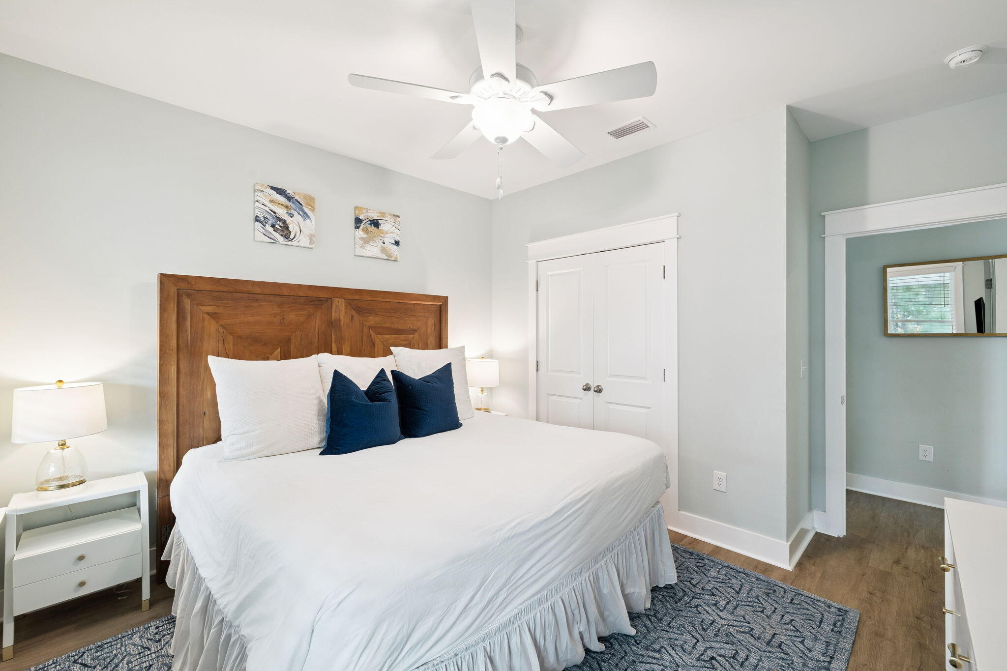 345 Dolphin Drive Santa Rosa Beach, FL 32459 - Photo 39 of 73 a bedroom with a bed and a chandelier