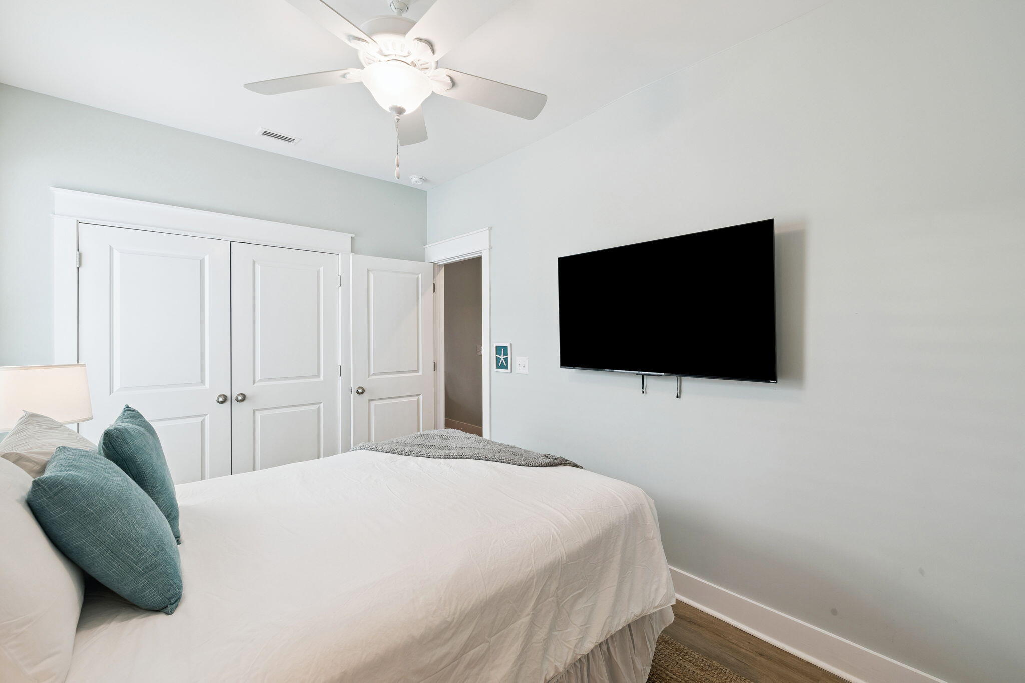 345 Dolphin Drive Santa Rosa Beach, FL 32459 - Photo 43 of 73 a bedroom with a bed and a flat screen tv