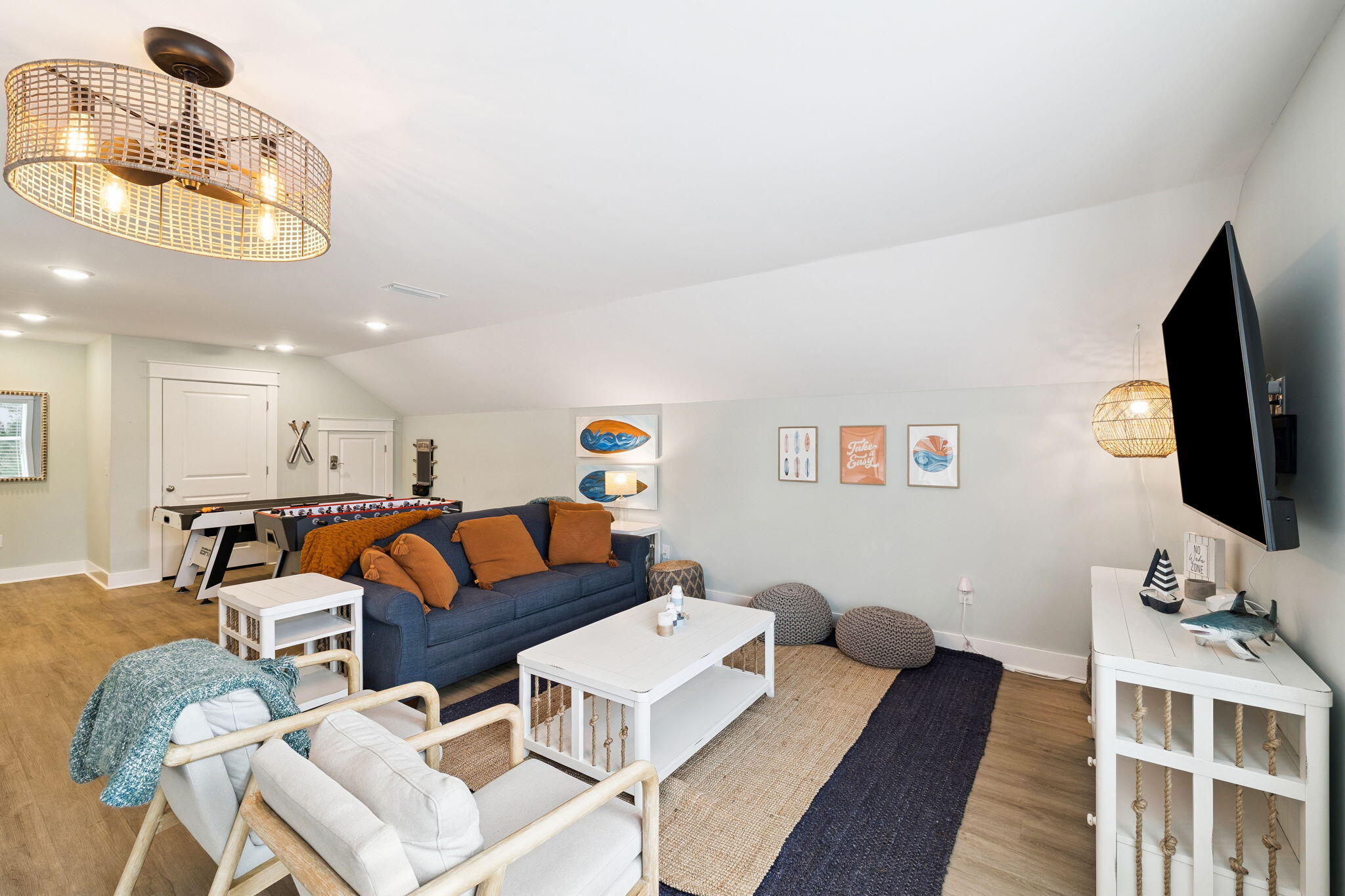 345 Dolphin Drive Santa Rosa Beach, FL 32459 - Photo 47 of 73 a living room with furniture a flat screen tv and kitchen view