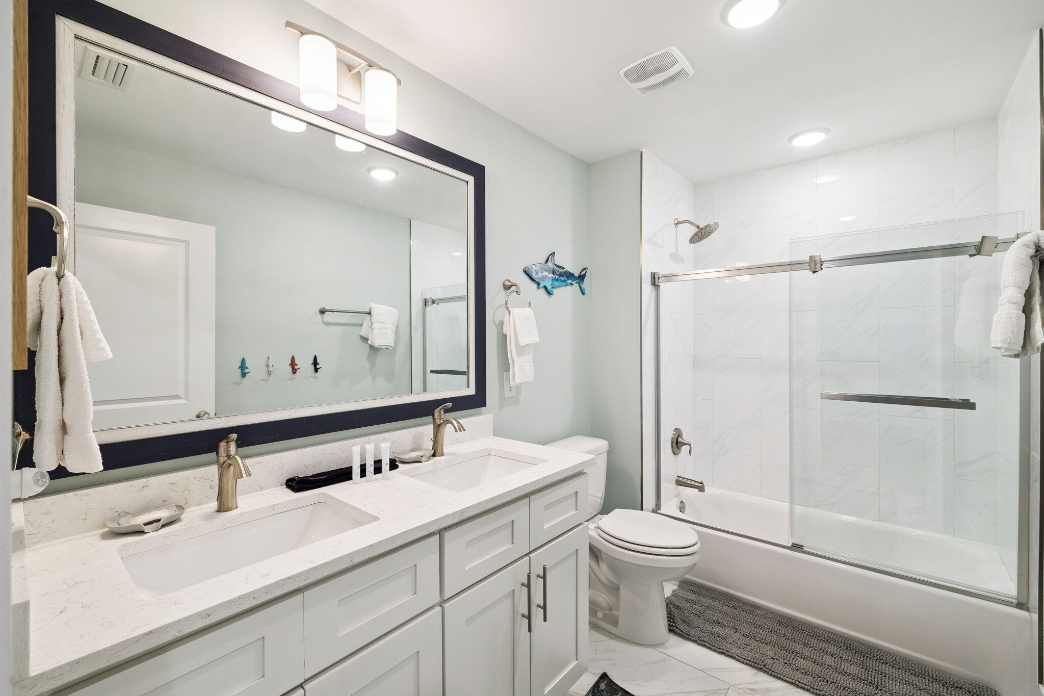 345 Dolphin Drive Santa Rosa Beach, FL 32459 - Photo 49 of 73 a bathroom with a sink a toilet and shower