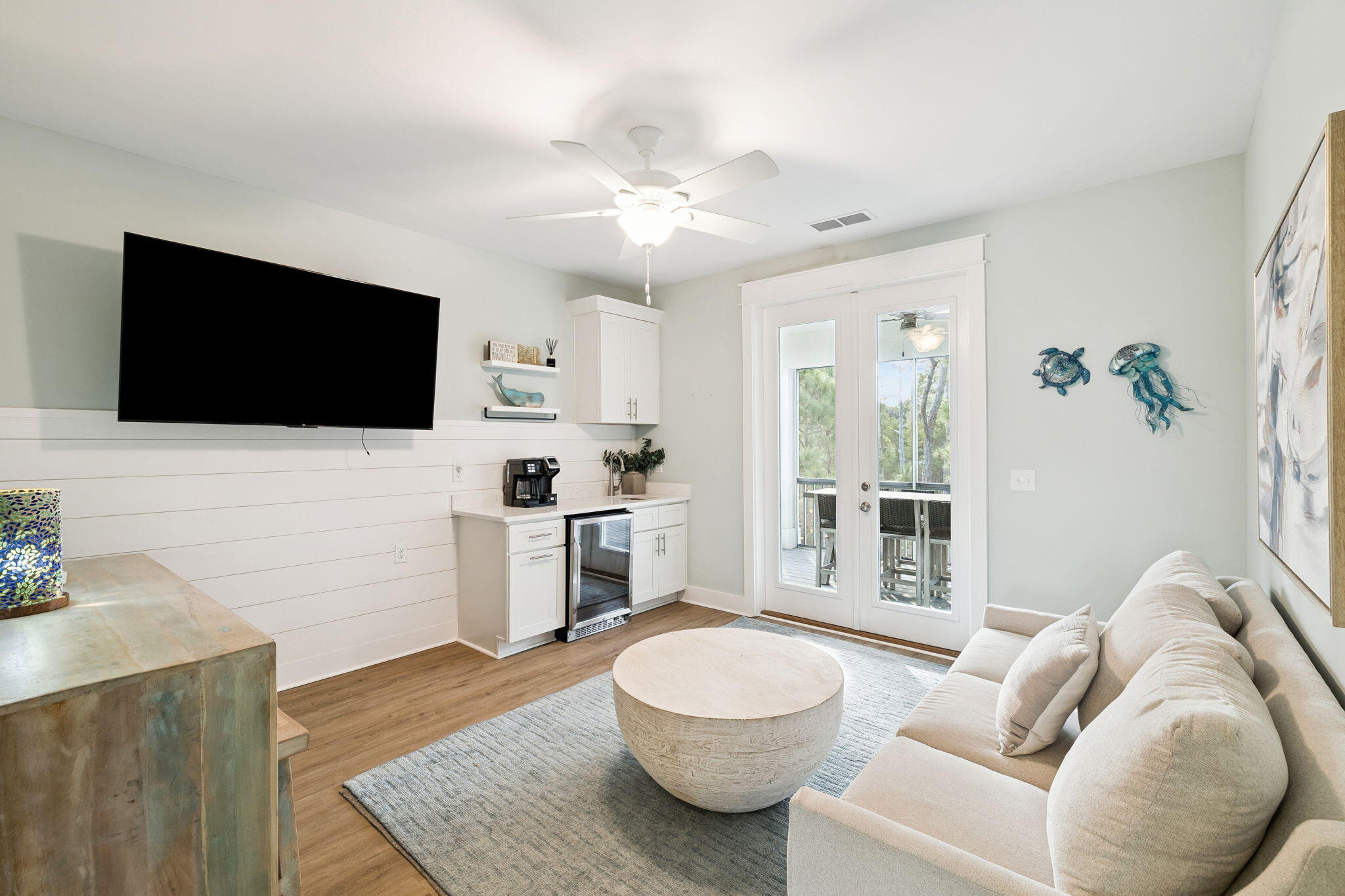 345 Dolphin Drive Santa Rosa Beach, FL 32459 - Photo 50 of 73 a living room with furniture and a flat screen tv