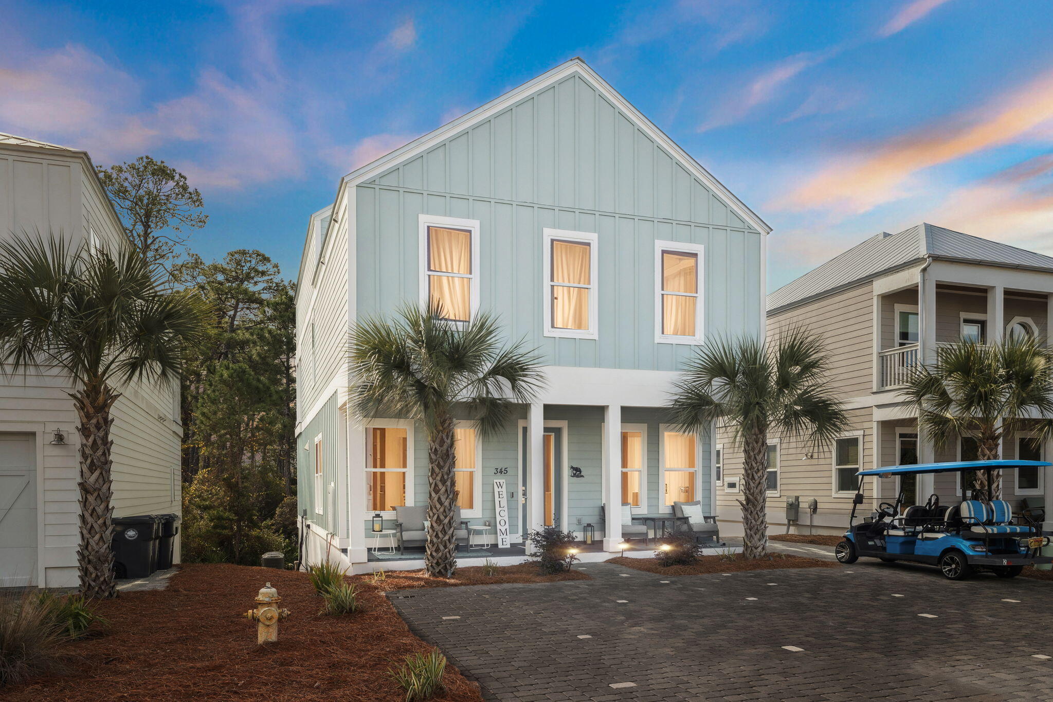 345 Dolphin Drive Santa Rosa Beach, FL 32459 - Photo 56 of 73 a front view of a house with a yard