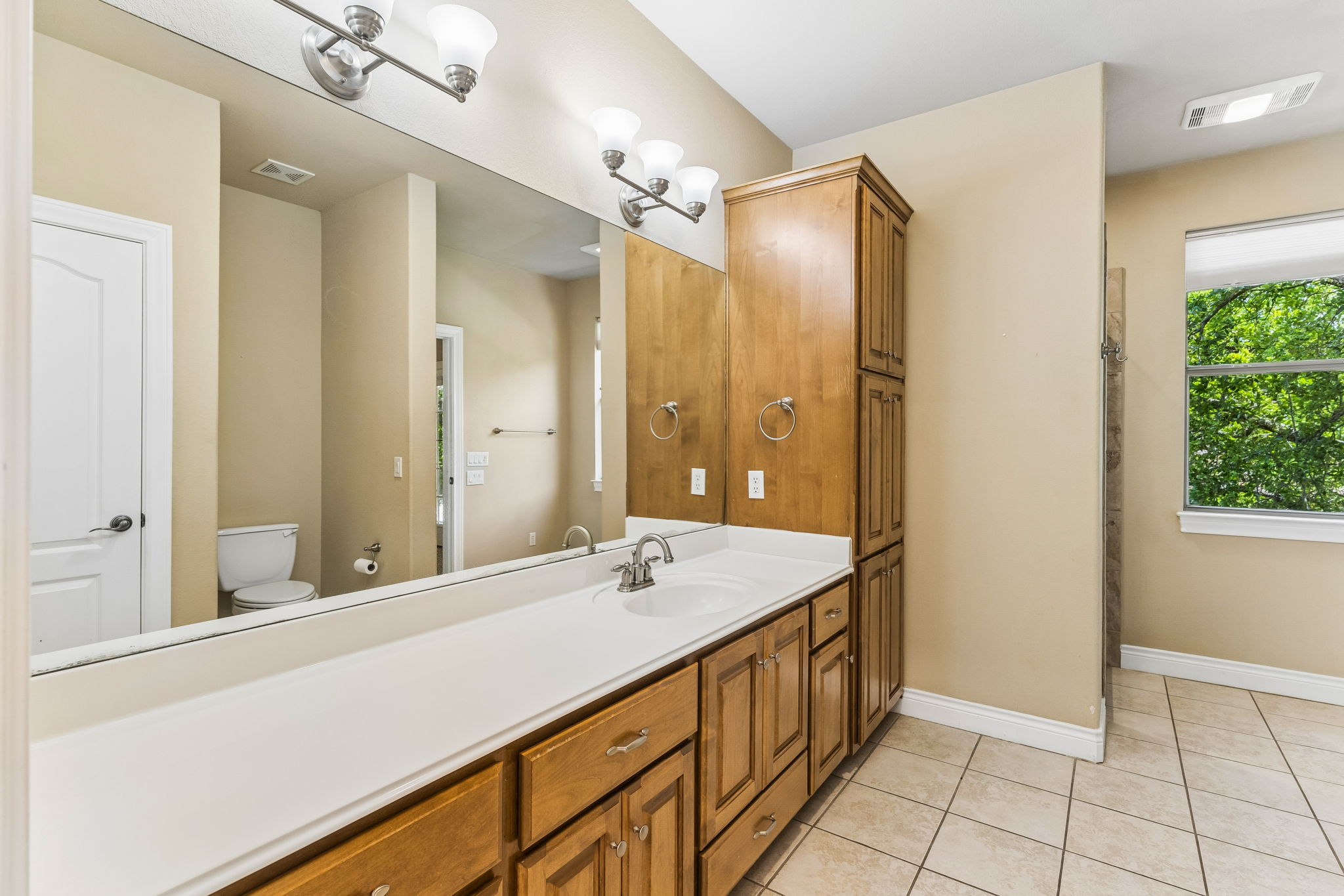 4802 Hidden Springs Trail Georgetown, TX 78633 - Photo 26 of 38 Bath #3 upstairs is oversized - generous counter space.