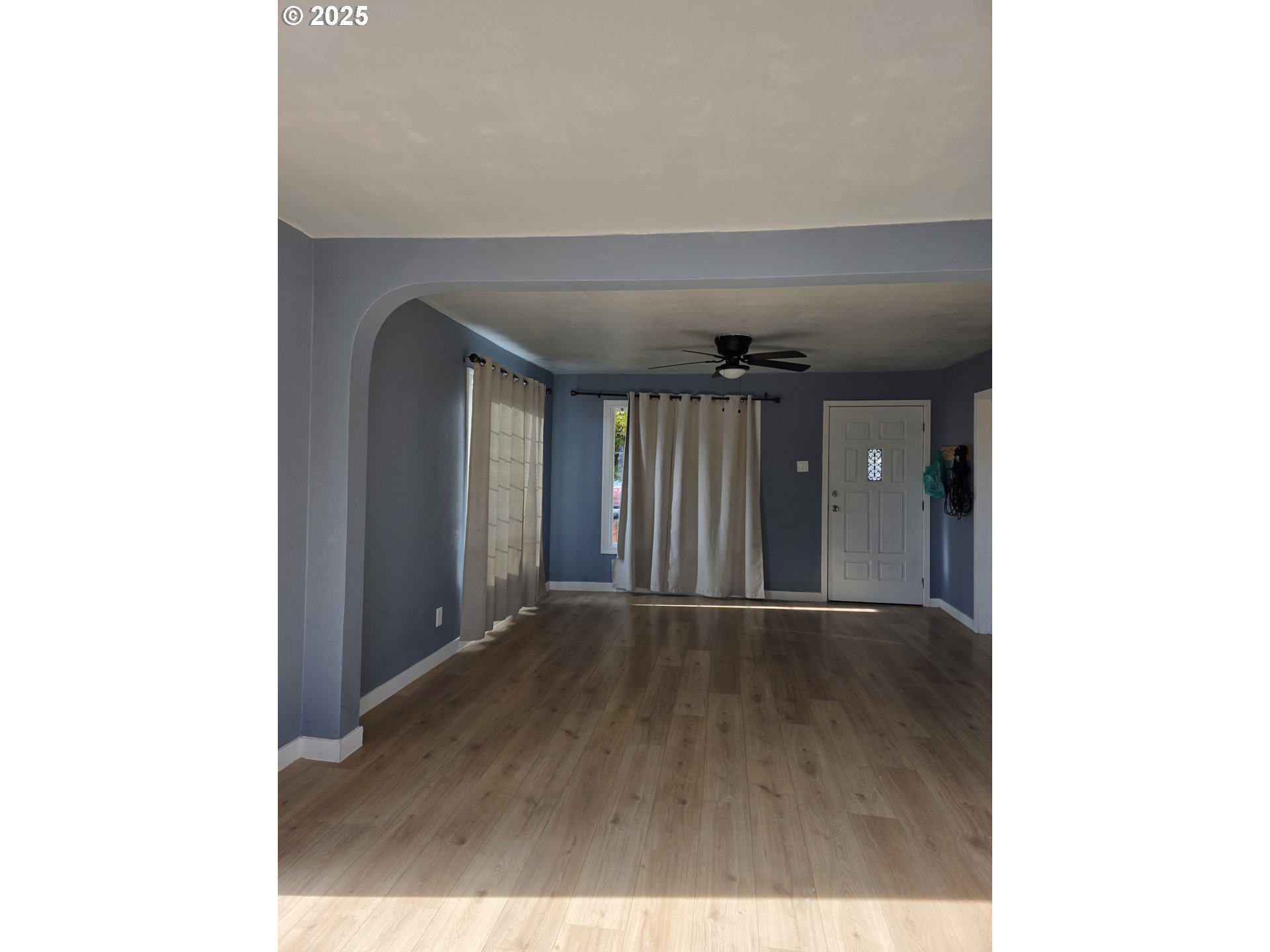 510 Northwest 11th Street Pendleton, OR 97801 - Photo 5 of 20 a view of an empty room with wooden floor