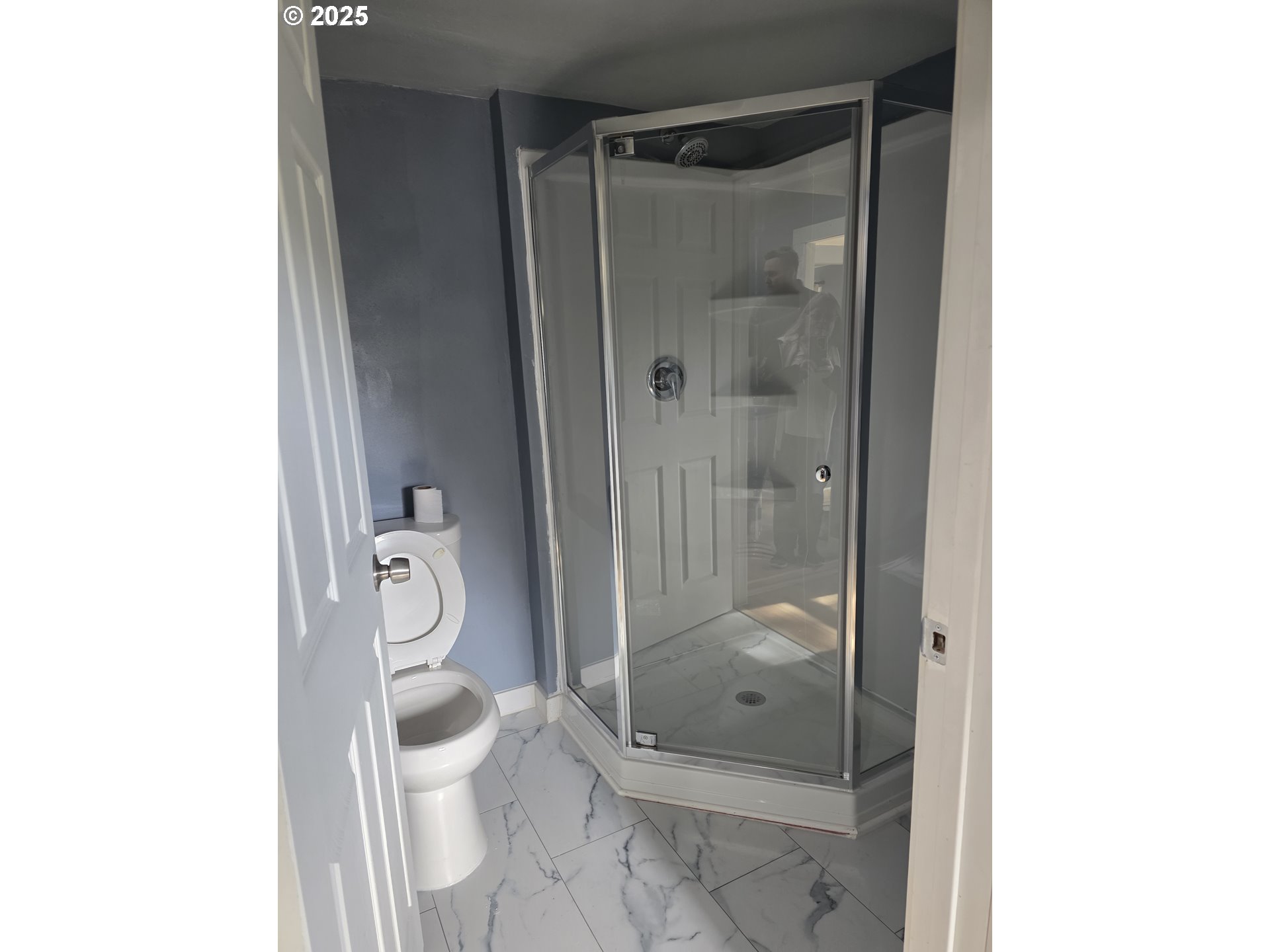 510 Northwest 11th Street Pendleton, OR 97801 - Photo 9 of 20 a bathroom with a granite countertop shower a toilet and a sink