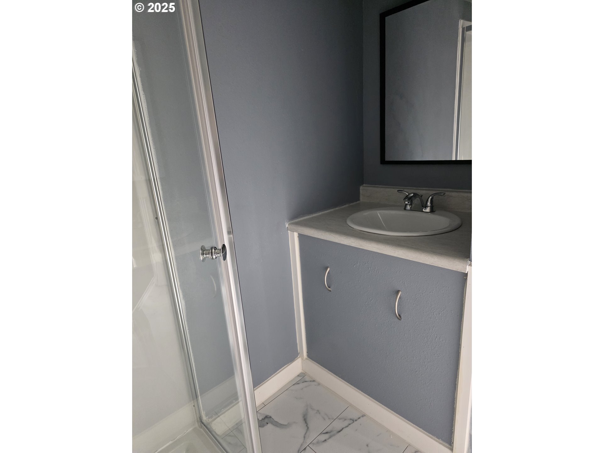 510 Northwest 11th Street Pendleton, OR 97801 - Photo 10 of 20 a bathroom with a sink and a mirror