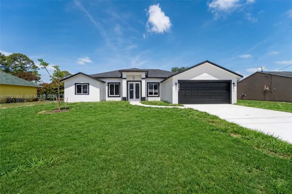 a house view with a garden space