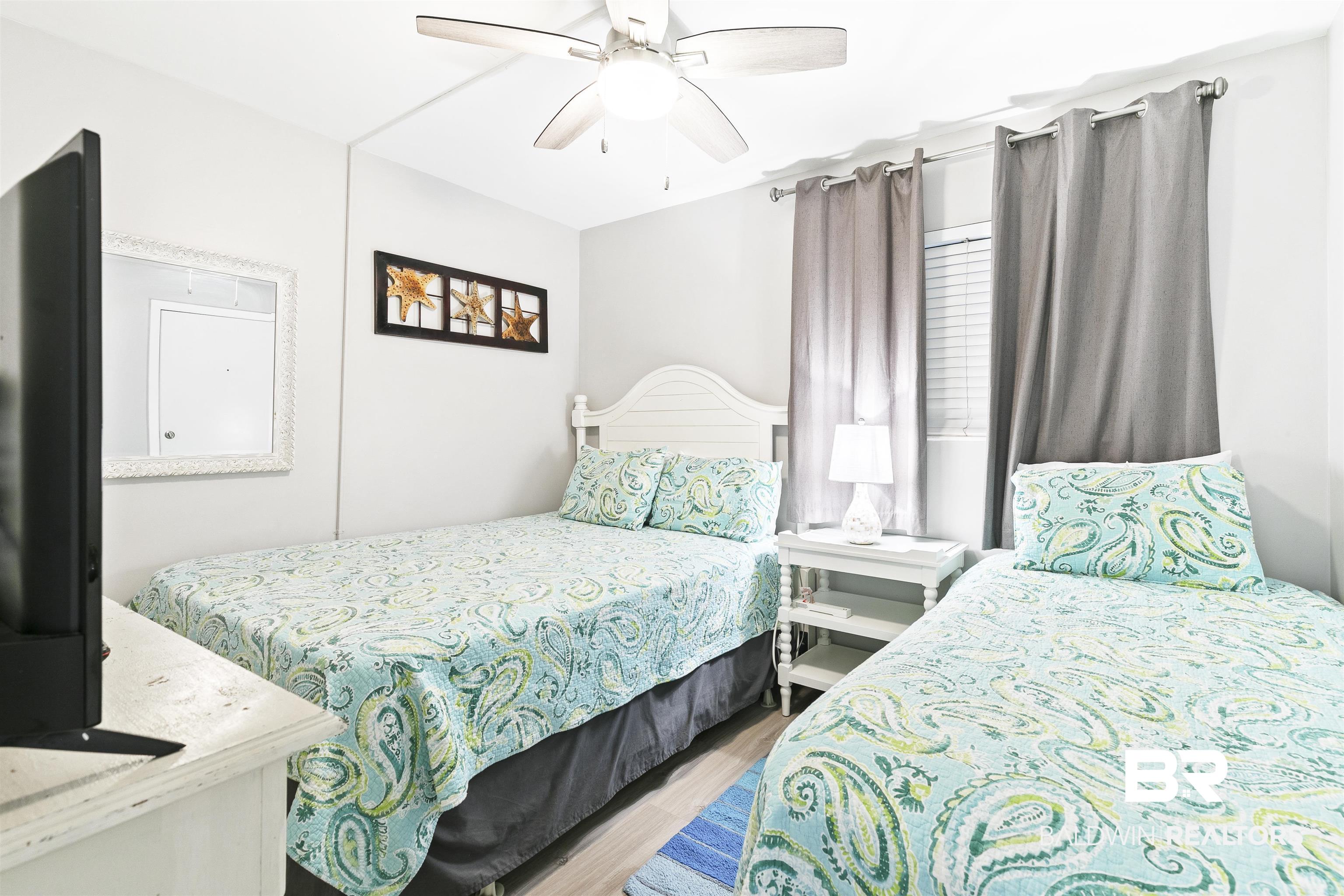 400 Plantation Road, Unit 3314 Gulf Shores, AL 36542 - Photo 25 of 47 Bedroom with light hardwood / wood-style floors and ceiling fan