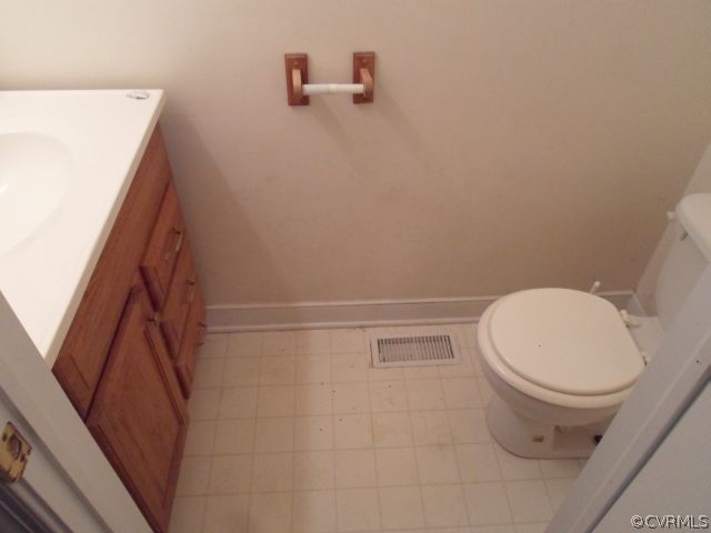 1312 Decatur Street Richmond, VA 23224 - Photo 5 of 7 a white toilet sitting next to a white sink