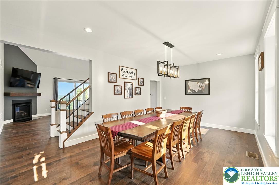 4733 Egypt Road Coplay, PA 18037 - Photo 14 of 40 a view of a dining room with furniture wooden floor and a chandelier