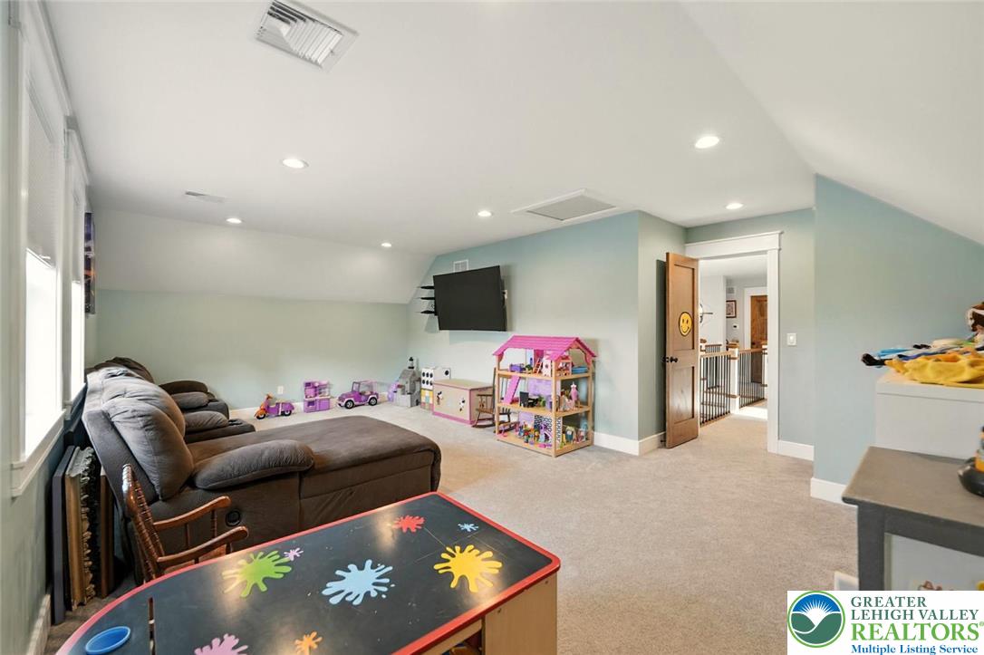 4733 Egypt Road Coplay, PA 18037 - Photo 23 of 40 a living room with furniture and a flat screen tv