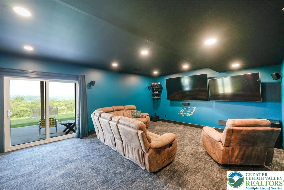 4733 Egypt Road Coplay, PA 18037 - Photo 25 of 40 a living room with furniture and a flat screen tv