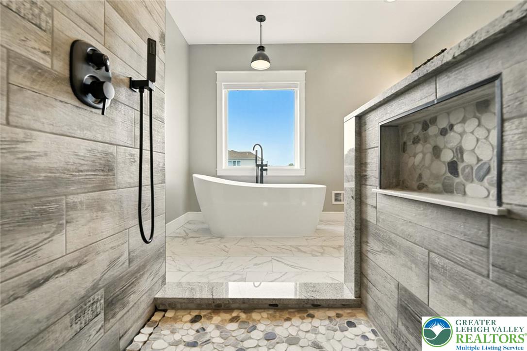 4733 Egypt Road Coplay, PA 18037 - Photo 6 of 40 a en suite bathroom with a shower